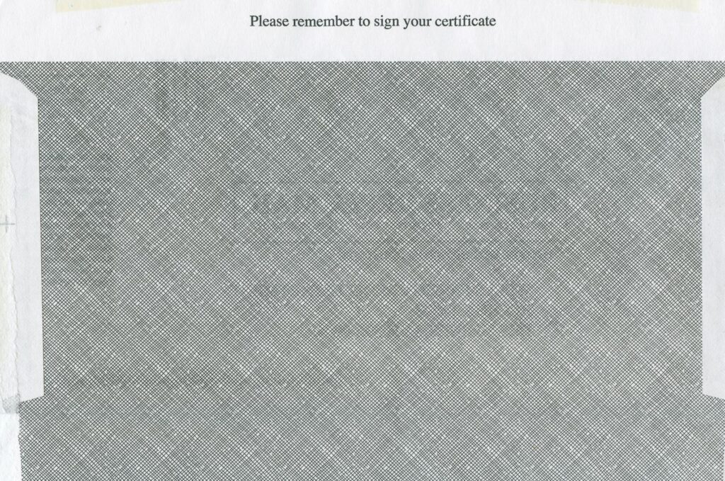 electric certification documents on desk with electrical panel background