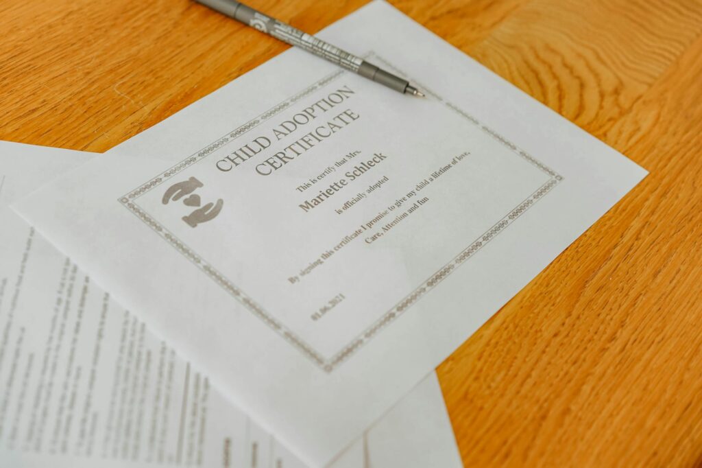 electric inspection certificate paperwork on desk with electrical panel background