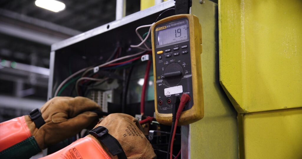 electrician inspecting electrical certification documents