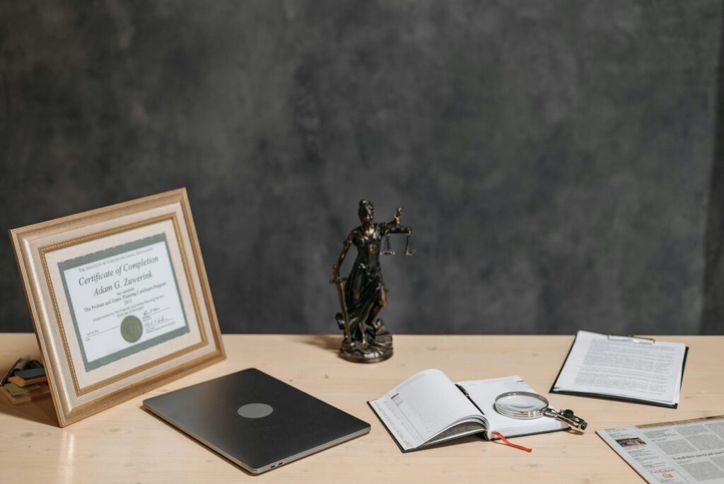 electricity certification documents and blueprint on a desk with a power panel background