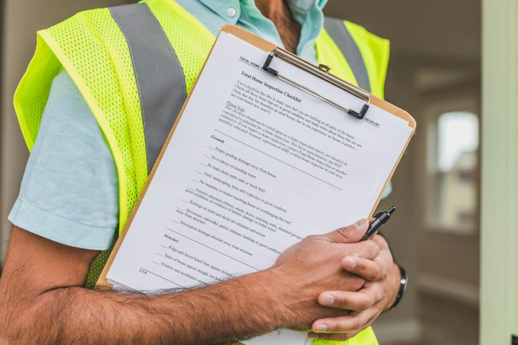 electrical inspection certificate and house wiring documents on work desk